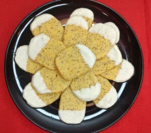 lemon and poppy cookies coated in white chocolate