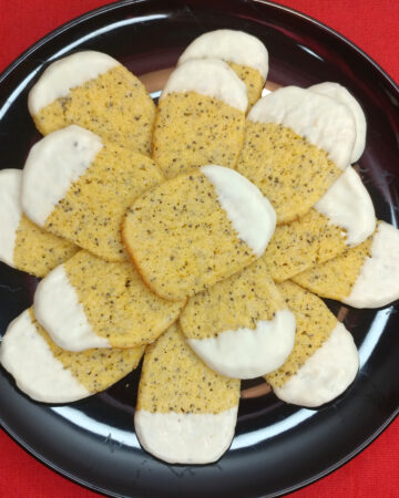 lemon and poppy cookies coated in white chocolate