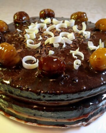 recipe vegan chocolate layer cake with chestnut cream and salted caramel glazing